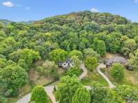 Incredible views and privacy from this home ~ the property backs to a wooded common area that can never be built on.