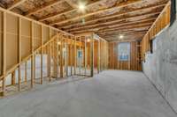 Full unfinished basement has so much potential! Builder has already added lighting and the plumbing rough ins for your future expansion.