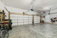 The 3-Car Garage offers insulated garage doors, equipment hangers, loft storage, room for a refrigerator and/or freezer, and space for a future workbench and/or additional storage.