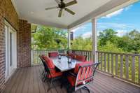 Outdoor Entertaining Galore! Overlooking the Back Yard, the Covered Deck has space for a Dining Area and a Sitting Area.