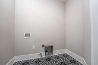 Laundry Room for side by side Washer and Dryer.