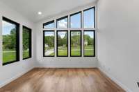 Impressive office with vaulted ceiling and mid-century inspired custom windows. The views are NOT computer generated, haha.