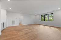 2nd floor rec room with abundant space for a large sectional, game tables and more