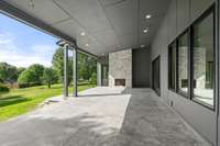 Massive back patio with room for a large sitting area and dining area.