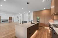 48" Wolf range with double oven and cabinet front dishwasher