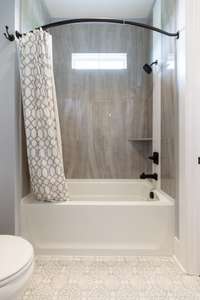 Gorgeous Marble Tile Shower in Jack and Jill bath.