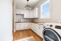 Very Spacious with Butcher Block Counter. Washer and Dryer will remain!