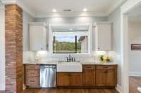 Lovely View from the Kitchen.  Double window above your Farmhouse sink - You will not mind doing all the dishes with this view!