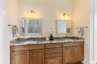 Granite/Double Vanities and Custom Soft-Close cabinets.