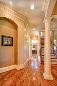 Spacious dining room located between the living room and kitchen.