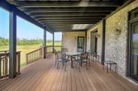 Back porch can be accessed from the living room, dining room and master bedroom.