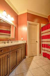 This bath has a walk in closet....Each bedroom has a bath and more than adequate closet space.