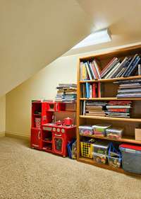 Nice little nook closet for toys and games in the upstairs den/landing area.