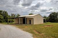 Equipment shed is large enough to store tractors and other equipment.