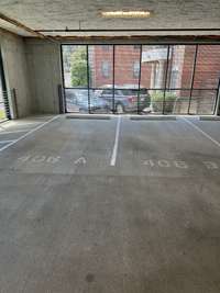 Two reserved parking spaces in the covered, ventilated attached parking tower.