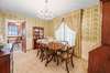 Formal dining connects to the eat in kitchen by way of the antique swinging door!