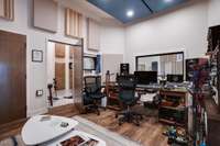 Recording Studio - mix room w/vox booth to the left, amp or storage room far left