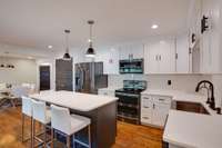 White & black color scheme & modern design, double oven, lots of prep room