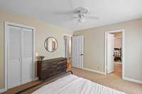 Another view of large secondary bedroom on the main level. Door on right leads to jack/jill bathroom.