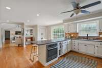 Kitchen flows to the great room and also overlooks the backyard.