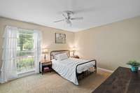 Large secondary bedroom on the main level. This is one of two bedrooms that share jack/jill bathroom.