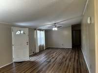 Living Room Looking into the Hall and 3 Bedrooms and Main Bath