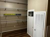 Large Utility Room with Washer & Dryer Hook-Ups and Eco Smart Tankless Water Heater & Huge Pantry Area Right off the Kitchen with an Exit Door to the Covered Back Deck.