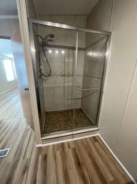 Primary Bath Room Shower with Glass Doors