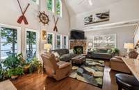 Open floor plan. Living room opens to kitchen and sunroom.