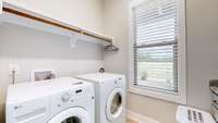 True laundry room, with full sink and counter top.