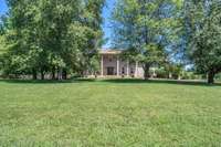 Beautiful brick home on a gorgeous level 2,89 acre lot!