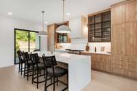 Another view of this gorgeous kitchen showing access to back covered porch