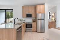 Fully functional kitchen includes all appliances.