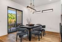 Dining room conveniently leads to the back covered porch overlooking the back yard, a perfect layout for nights in or entertaining a crowd