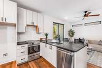 Fully functional kitchen includes all appliances. Note: Photo taken prior to installation of refrigerator and microwave.