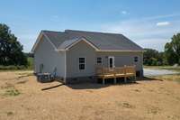 Large deck off the kitchen! Perfect place to relax and enjoy your 2.51 acre lot!