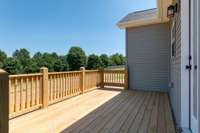 Large deck off the kitchen! Perfect place to relax and enjoy your 2.51 acre lot!