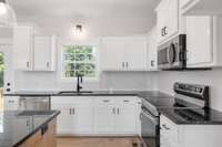 Plenty of storage in this custom kitchen!