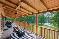 The wraparound double decks are truly one of the highlights of this home! Such a perfect space to enjoy the lake view from your swing, dine outside to take advantage of the wonderful weather, or sip lemonade on your rocking chairs