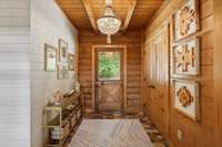 Foyer into the perfect modern cabin, where rustic charm meets elegance