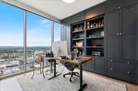 2nd bedroom on the glass with custom built-ins, seller uses this space as an office.