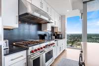 Kitchen features Wolf SubZero appliances and 6 burner, dual oven.