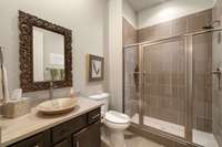 Third full bathroom with tiled shower, new vanity, countertop, sink and fixtures!