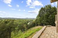 Walkway down to the basement overlooking the river