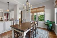 Breakfast room with storage cabinets and built in shelves.