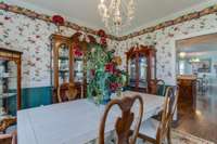 The dining room opens to the kitchen providing a seamless transition. A front door in the dining room leads out to the charming front porch.