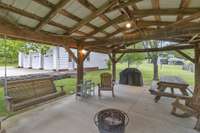 Large covered patio to enjoy gatherings and grilling.