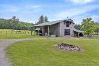 Hay Barn on the property is 30x50 with a 14x50 lean with a full loft.