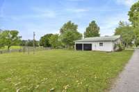 Back of your 3 car garage is additional storage bays for your riding mower and day-to-day equipment.