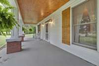 Enjoy this welcoming front porch that sets off the whole tone for this amazing property - Tranquil!